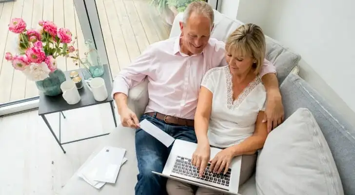 Couple Conveniently Buying New Home Online Remote Electronic Notary Signing